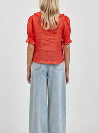 A. Ren Robine Ruffle Top